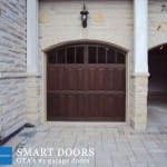 Custom Wood Garage door with glass inserts installed