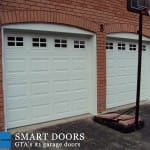 White carriage style barn garage doors installed in Markham