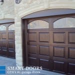 Raised panel fiberglass Garage door with glass insert installed by smart doors in Vaughan home