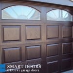 Raised panel fiberglass Garage door with glass insert installed by smart doors in vaughan