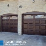 Double Raised Panel Fiberglass garage doors with glass inserts installed in VaughanHome