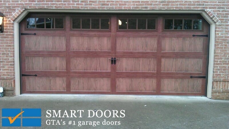 red cedar Wooden accent garage doors installed by smart doors in Toronto