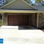 Toronto installation of Oak wood tone double garage doors