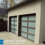 Full view glass garage doors installed in north York by smart doors
