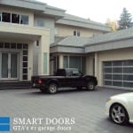 Modern Glass garage door installed at Vaughan home