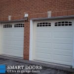 Garage Door replacement project Markham featuring Raised Long Panel white Garage Doors Installed and Replaced