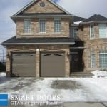 Garage Door replacement project Markham featuring two Raised Long Panel Garage Doors Installed