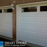 Garage Door replacement project King City featuring Raised Long Panel Garage Doors Installed and Replaced