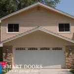 Toronto garage door replacement project showcasing raised panel garage door with glass inserts installed by smart doors