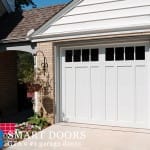 New white Carriage style double Garage Doors installed in north york