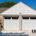 New white Carriage style double Garage Doors installed in Markham