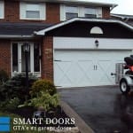 Toronto Garage door replacement project featuring barn style garage doors installed