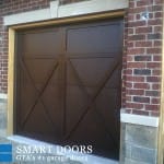Vaughan Garage door replacement project featuring barn style garage doors with overlay installed
