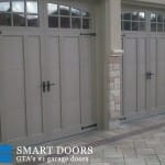 concord Garage door replacement project featuring barn style garage doors with windows installed