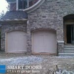 Markham Garage door replacement project featuring barn style garage doors installed