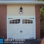 Toronto home replacement of Carriage style overlay garage door