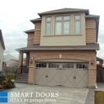 Double panel Carriage style overlay garage door replacement Markham