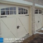 Carriage style overlay garage door replacement Thornhill featuring window inserts