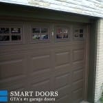 Recessed Panel overhead Garage door with window insert installed in Toronto