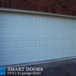 raised panel White Garage door replacement in Toronto by smart doors