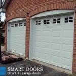 White raised panels Garage Doors with window inserts installed in Toronto