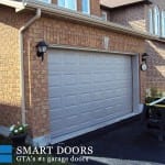 Short raised panel Garage doors installed in Toronto home