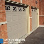 raised panel garage door with window insert installed in Markham home