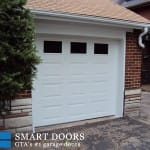 Garage Door with window inserts installed in Toronto by smart doors