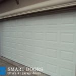 Raised panel Garage Door installed in Toronto by smart doors