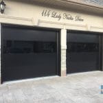 Modern Black Garage Doors installed in Maple