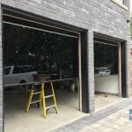 modern Glossy Black Glass Garage Door Installation in Markham