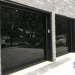 Glossy black Fiberglass garage door installed in Markham