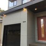 Modern Flush Black Garage door by smart doors Toronto
