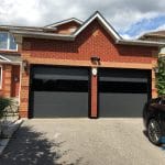 Modern Smooth Garage door with glossy glass insert