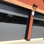Modern Smooth Garage door with glossy glass insert and Matt finish