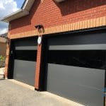Modern Smooth fiberglass garage door replaced in Bolton