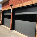 flush black garage door installed by smart doors Toronto
