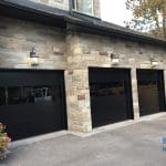 set of 3 Matt black modern garage doors installed in Thornhill near Toronto