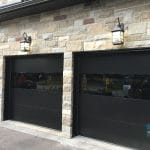 black modern fiberglass garage doors installed in Thornhill near Toronto