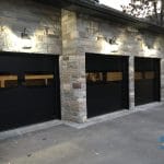 modern black garage doors in this Toronto residence