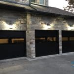 Pair of three Black Glass Garage Doors Installation in Toronto