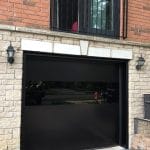 matt black smooth garage door installed by Smart Doors Toronto