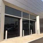 Smooth Back Glass Garage Doors- Toronto Commercial Garage Doors Installation