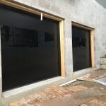 Modern Black Smooth Garage Doors Installation Project in Toronto