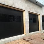 Smooth Black glossy overhead Garage Doors Installation Project in Toronto