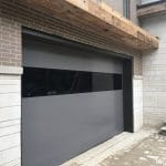 Smooth finish flush panel garage doors installation project in Richmond Hill