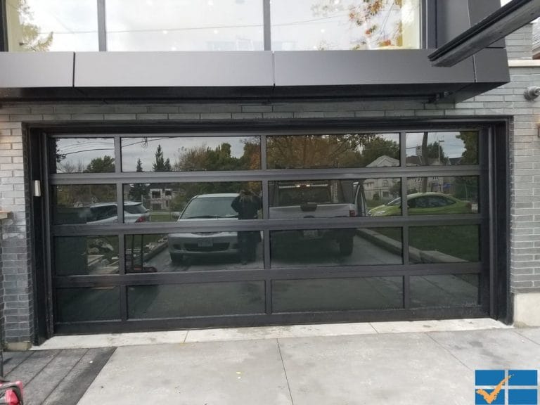 Black Full View overhead glass garage doors Installation In Vaughan