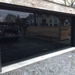 Toronto Installation of Modern Black Glass Garage Doors