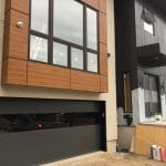 Smooth Black Garage Doors with Glass inserts