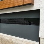 Smooth Black Garage Doors with glass inserts